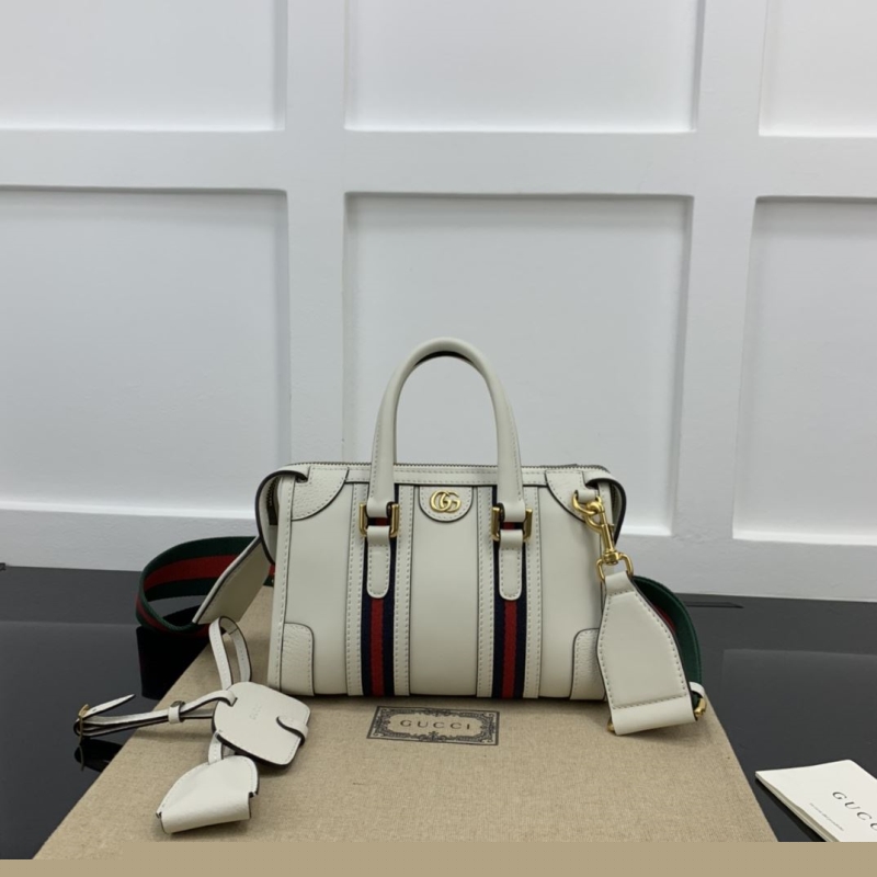 G*u*i top handle bags